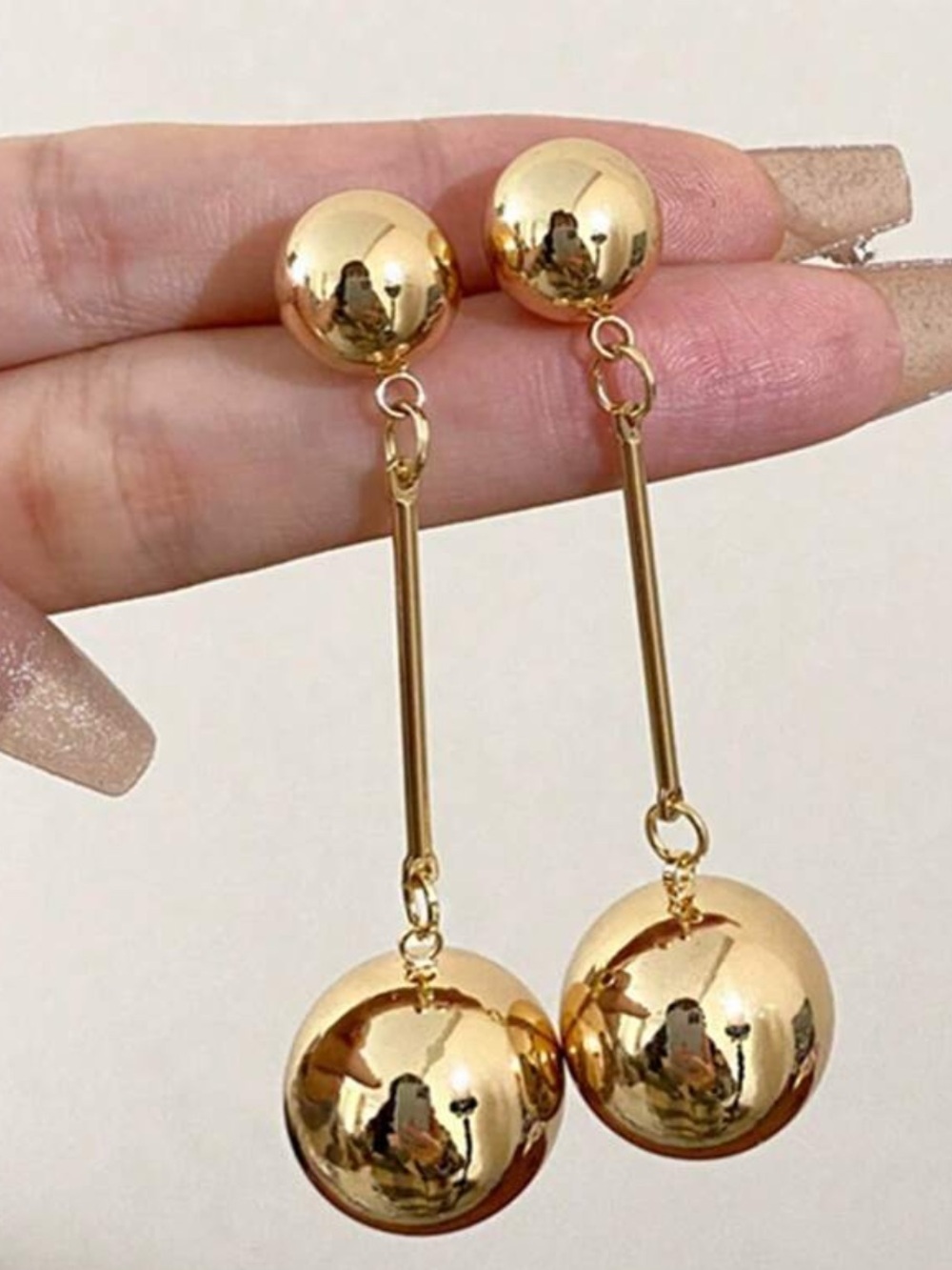Gold Dangle Ball Earrings